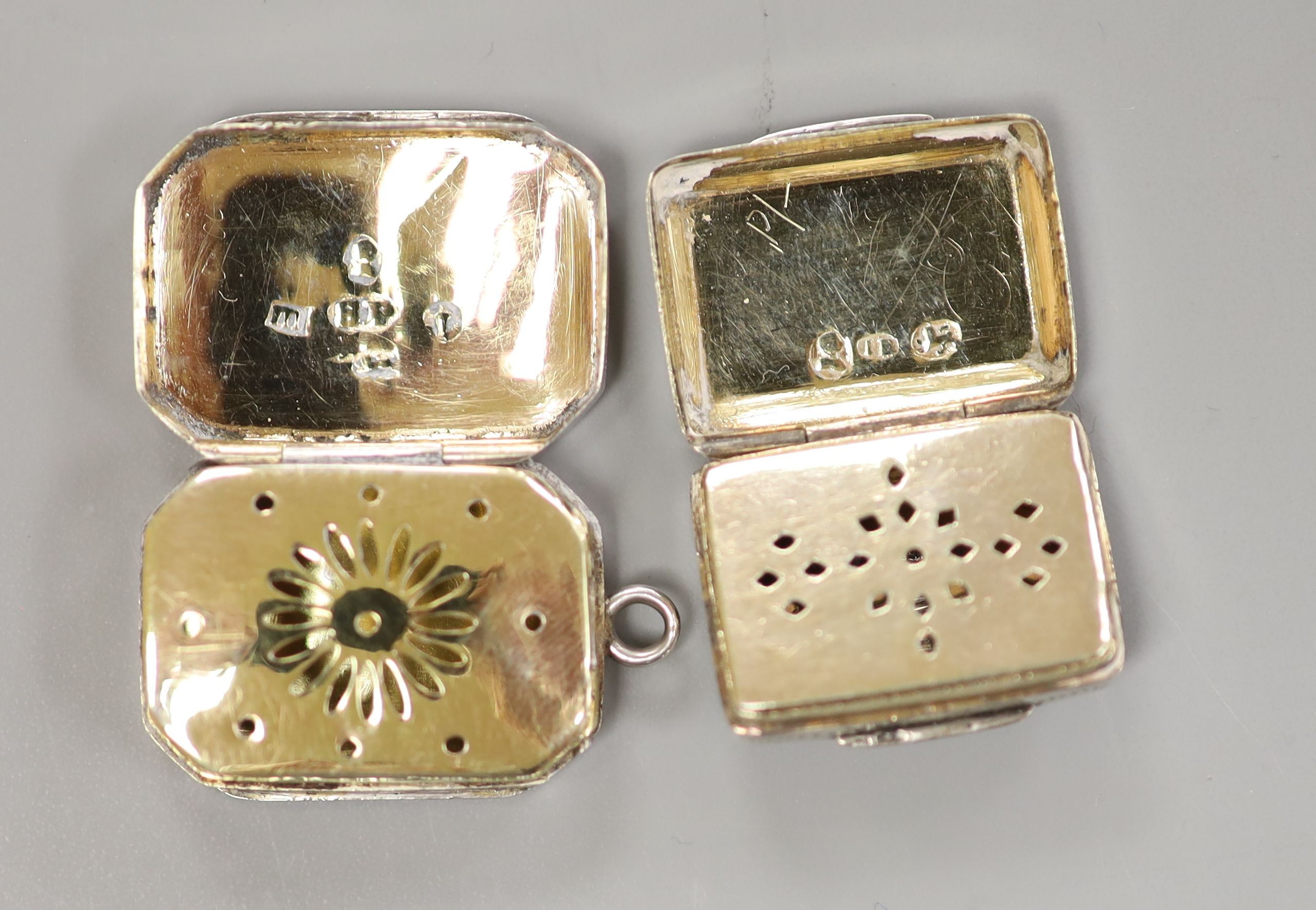 A George III silver vinaigrette, Samuel Pemberton, Birmingham, 1810, 25mm and a William IV silver vinaigrette, Joseph Betteridge, Birmingham, 1830, 21mm.